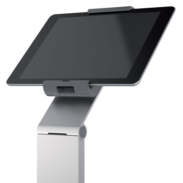 A silver metal tablet stand holding a tablet.