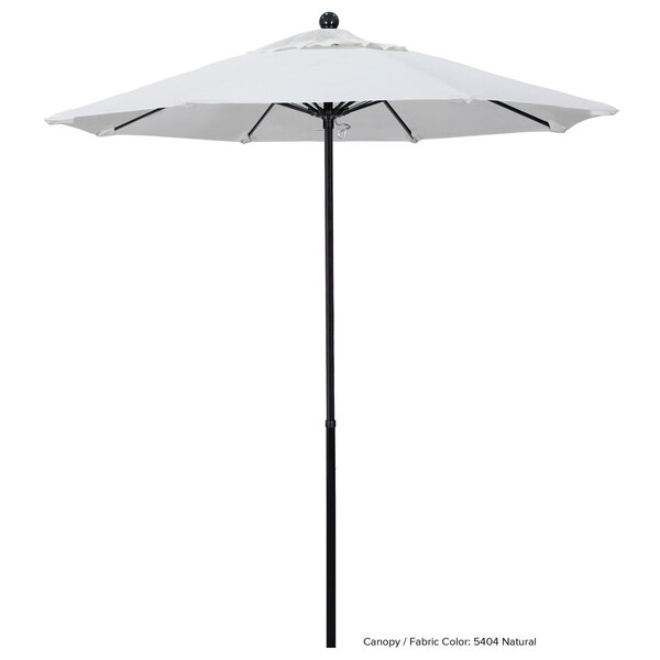 A white California Umbrella with a white Sunbrella canopy on a black pole.