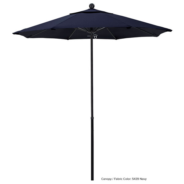 A close up of a California Umbrella Oceanside Sunbrella canopy on a fiberglass pole.