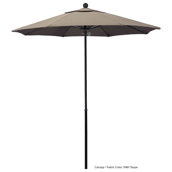 A California Umbrella Sunbrella Oceanside round umbrella with a black pole.