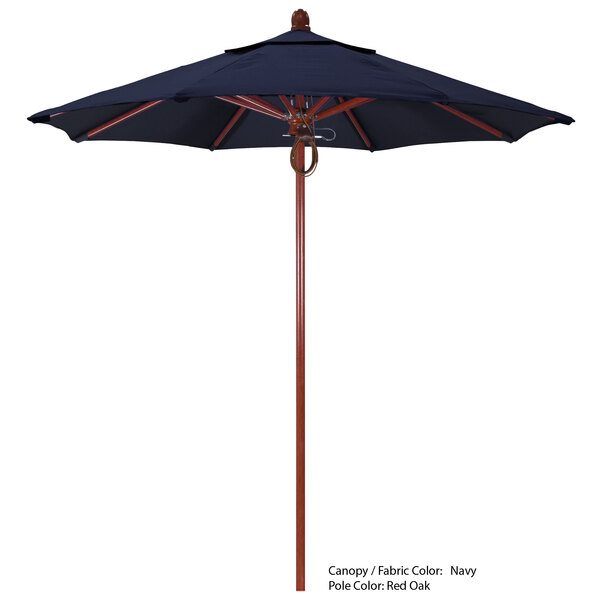 A blue California Umbrella with a Sierra Sunbrella canopy on a white background.