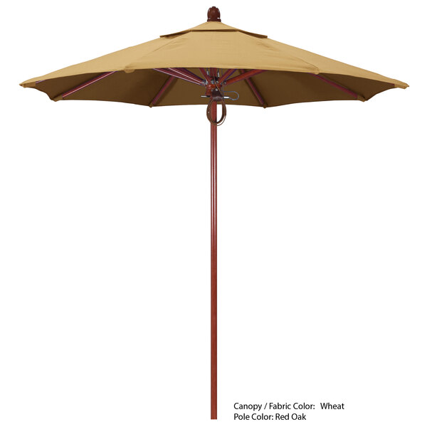 A brown California Umbrella with a Sunbrella tan canopy and a pole.