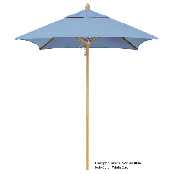 A blue California Umbrella with a wooden pole on a white background.