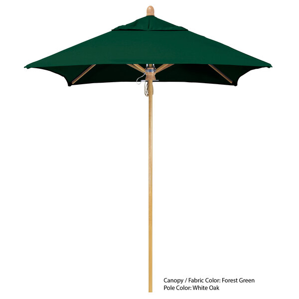 A California Umbrella Sierra Sunbrella canopy on a wooden pole.