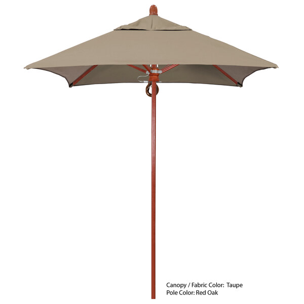 A close-up of a California Umbrella with a tan and brown Sunbrella canopy.