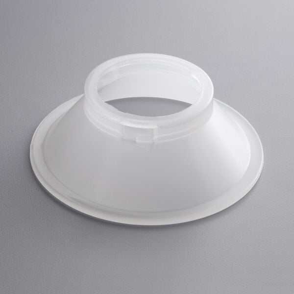 A white plastic flange for a Backyard Pro Butcher Series #32 Sausage Stuffer.