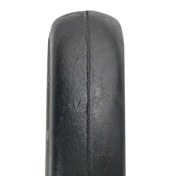 A close-up of a black Magliner rubber wheel.