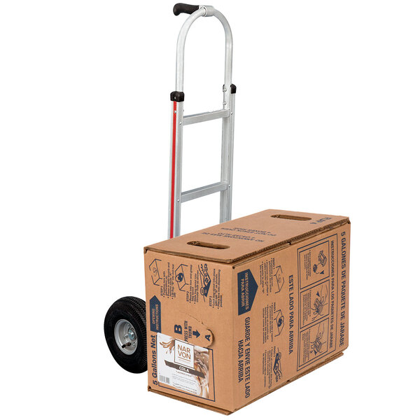 A Magliner hand truck with a cardboard box on it.