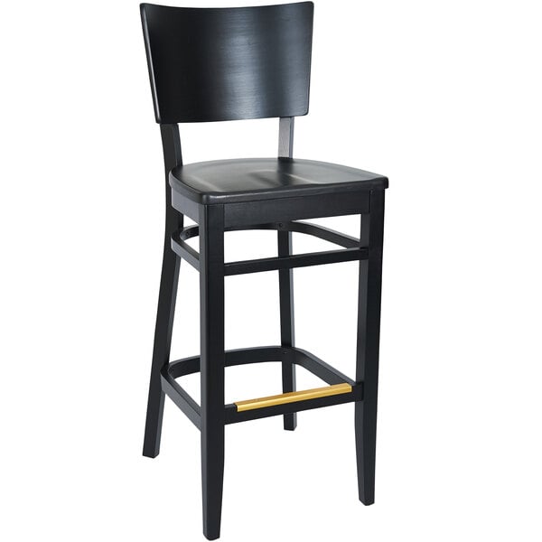 a black chair with a wooden seat