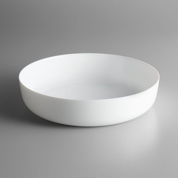 a white bowl on a gray background