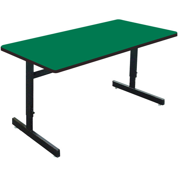 A green rectangular Correll computer table with black legs.