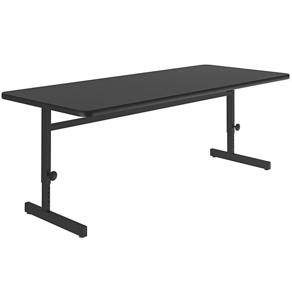 A black rectangular Correll computer table with adjustable height.