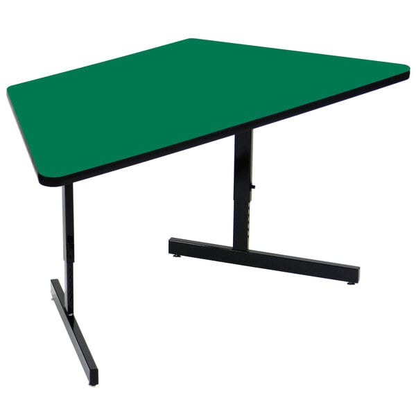 A Correll green trapezoid computer table with black legs.