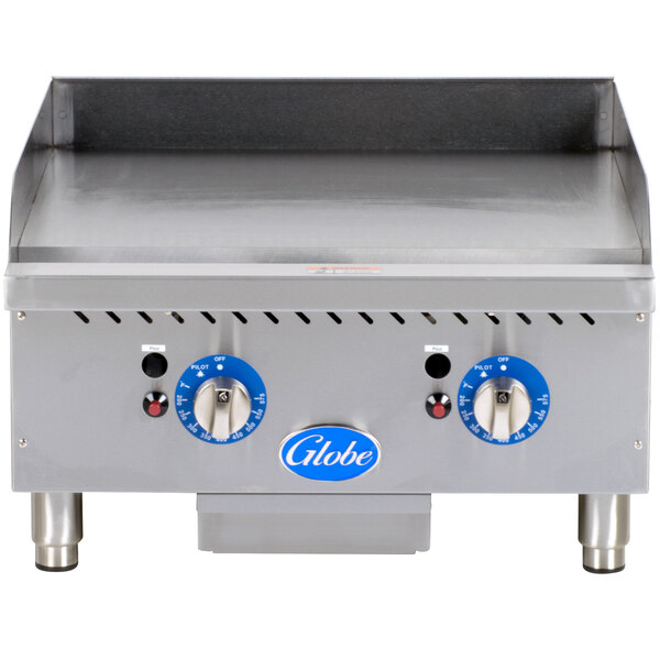 A Globe countertop gas griddle on a counter.