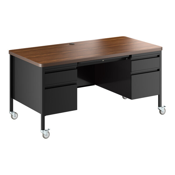 A black and walnut mobile double pedestal teacher's desk with drawers and caster wheels.