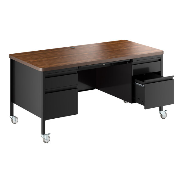 A mobile double pedestal teacher's desk with a black base, walnut top, multiple drawers, and caster wheels.