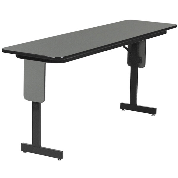 A black rectangular Correll seminar table with black panel legs.