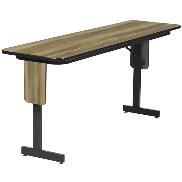 A rectangular Correll seminar table with Colonial Hickory top and black panel legs.
