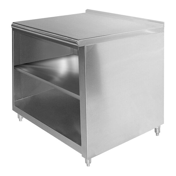 A stainless steel Advance Tabco cabinet base work table with a fixed mid shelf.