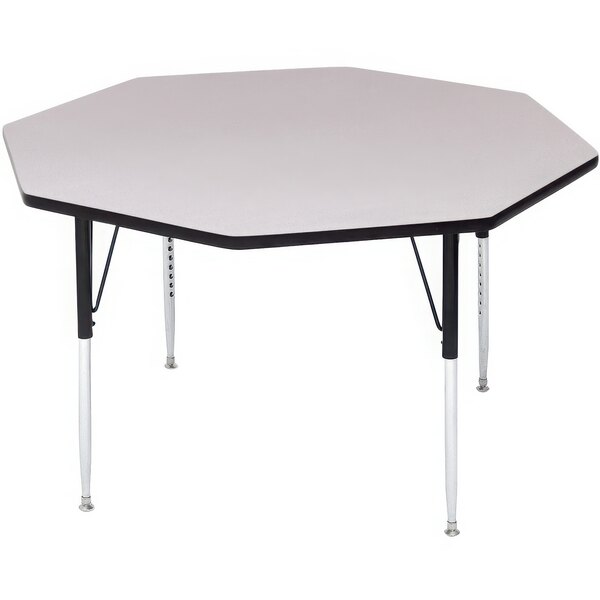 A gray granite octagon activity table with black legs.