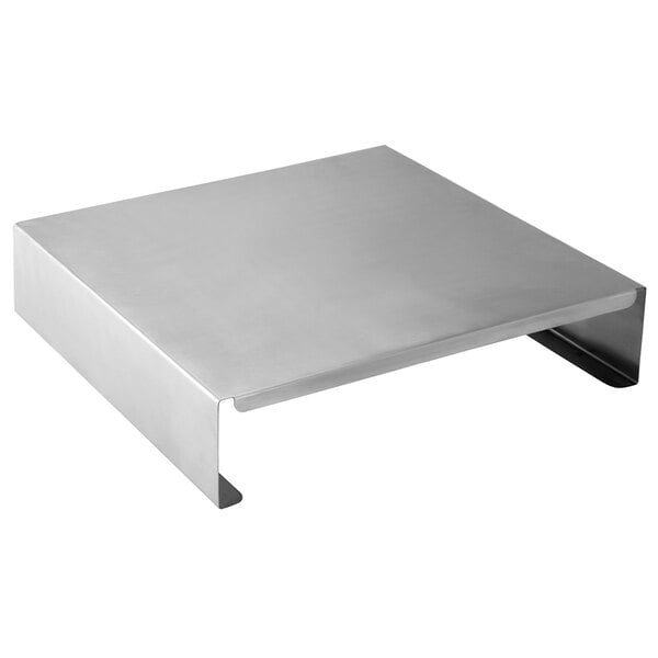A silver stainless steel Walco chafer burner stand on a table.