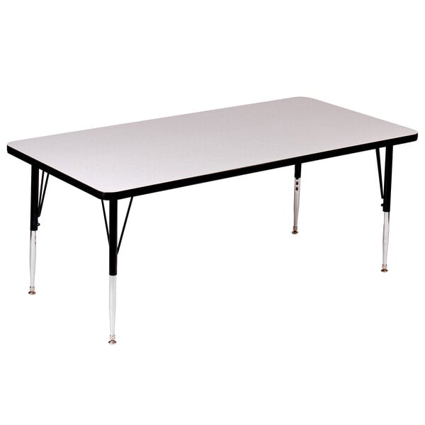 a rectangular white table with black legs