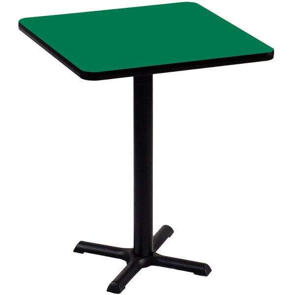 A Correll 42" square green bar height table with a black base.