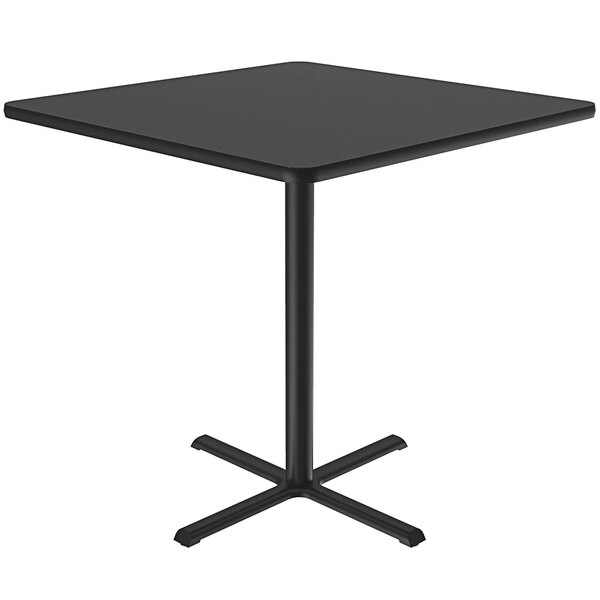 A Correll black square table with a metal base.