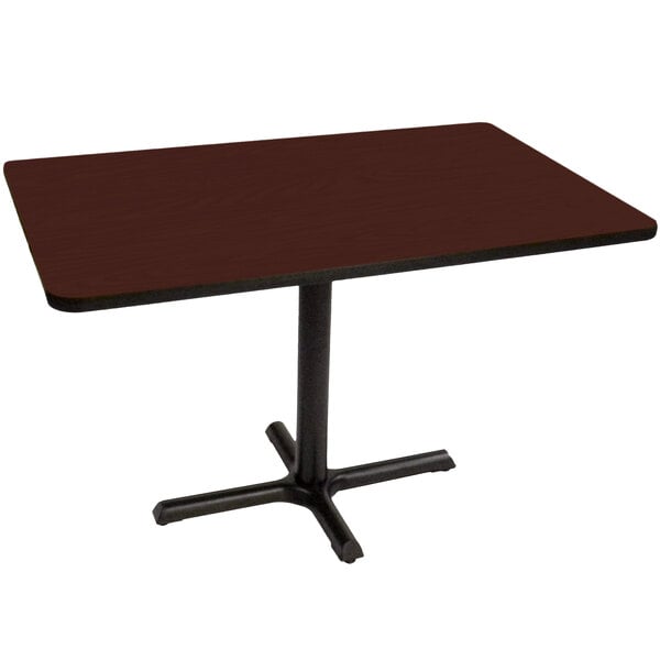 A brown rectangular table with a black base.