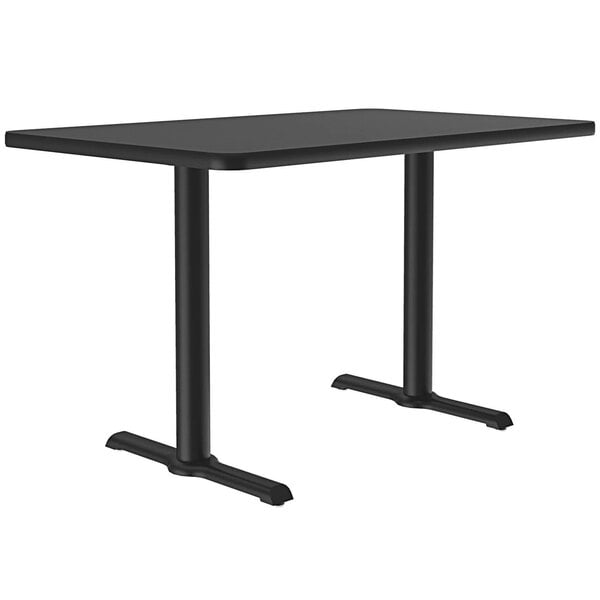 A black rectangular Correll table with two T bases.