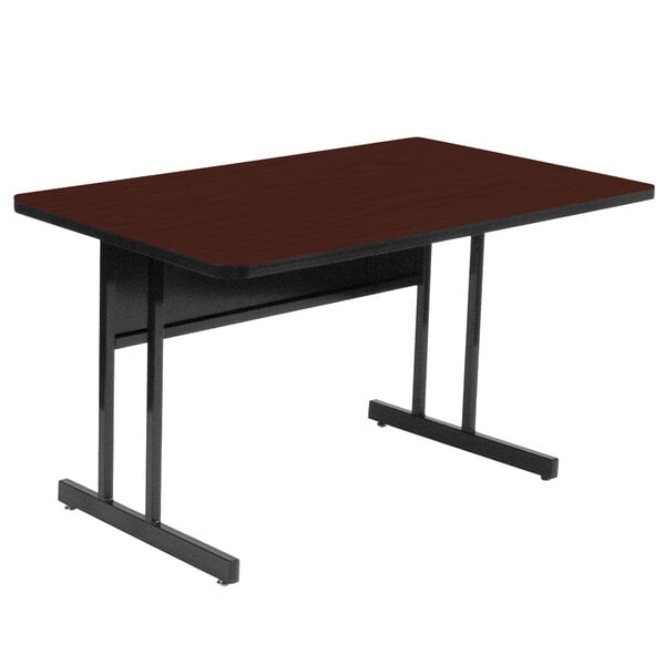 A brown rectangular Correll desk with black legs.