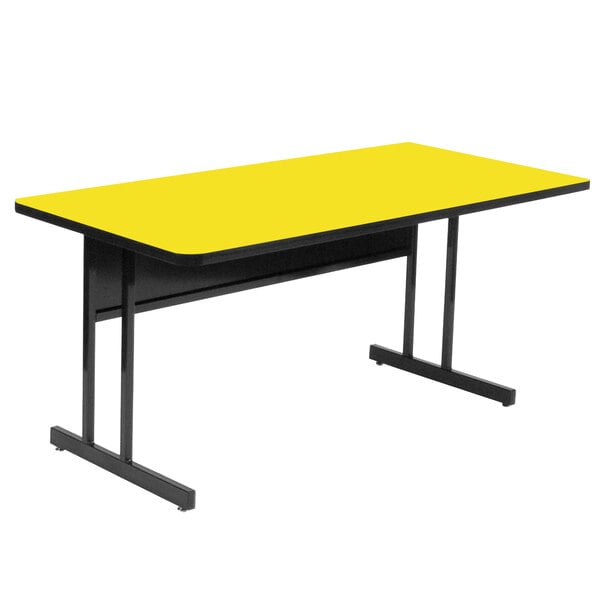 A yellow rectangular table with black legs.