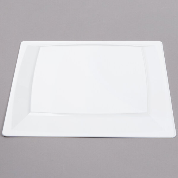 A white rectangular WNA Comet Milan plastic plate with a white square border.