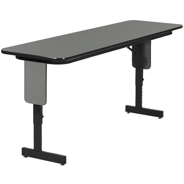 A black and gray rectangular Correll seminar table with panel legs.