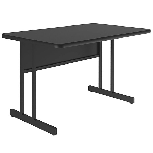 A black rectangular desk with metal legs.