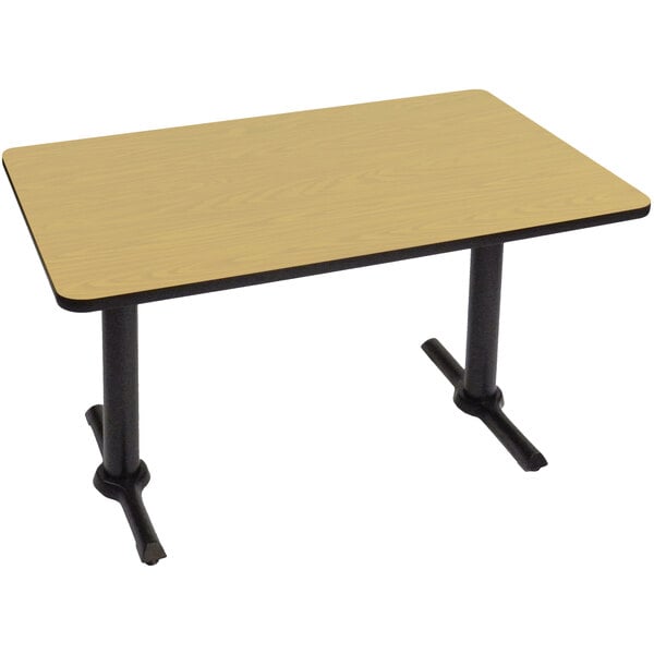 A rectangular table with two black T bases.