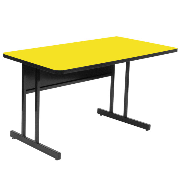 A yellow rectangular table with black legs.