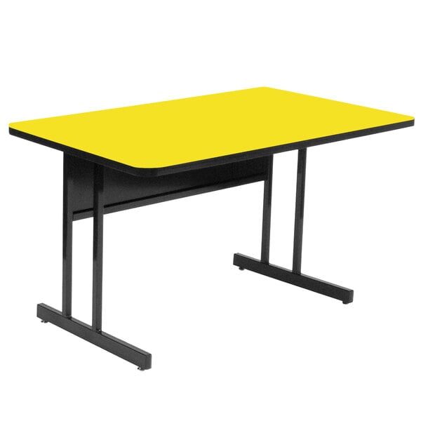 A yellow rectangular Correll desk with black legs.