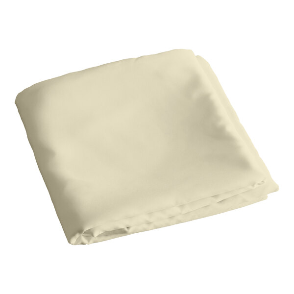 A folded ivory Intedge square table cover on a white background.