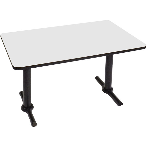 A white rectangular Correll table with two black T bases.