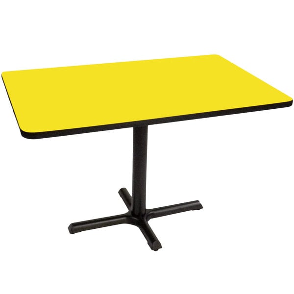 a yellow rectangular table with a black base