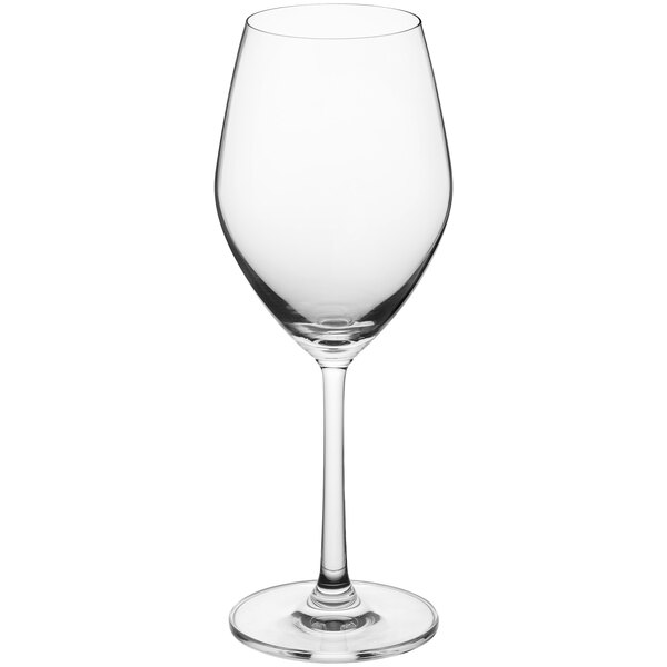 A close-up of a clear Acopa wine glass with a stem.