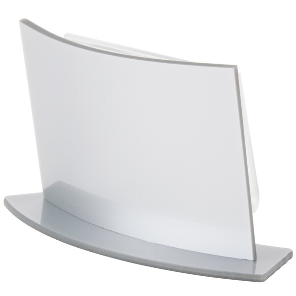 A white plastic Cal-Mil Forma displayette with a silver edge.