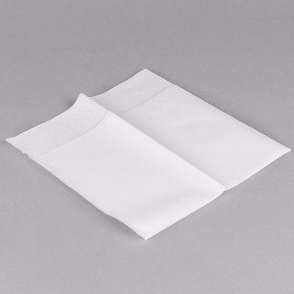Two white Hoffmaster Quickset Linen-Like dinner napkins on a gray surface.