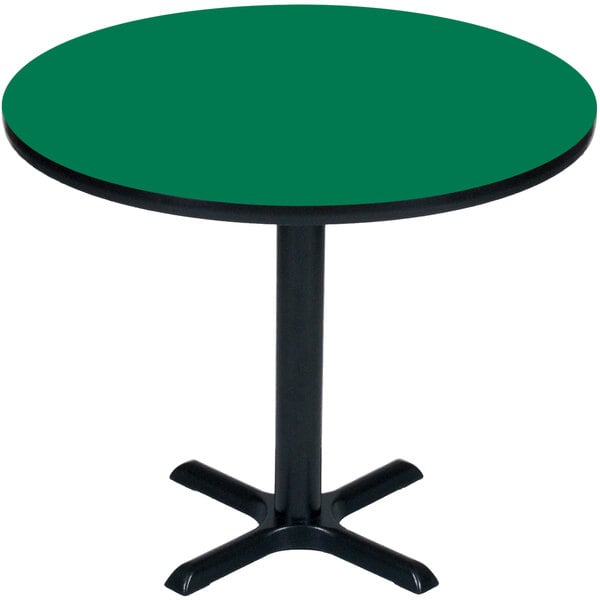 A green Correll bar height table with a black base.