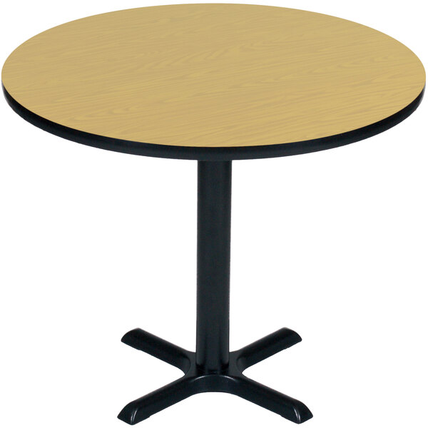 A Correll round table with a black base.