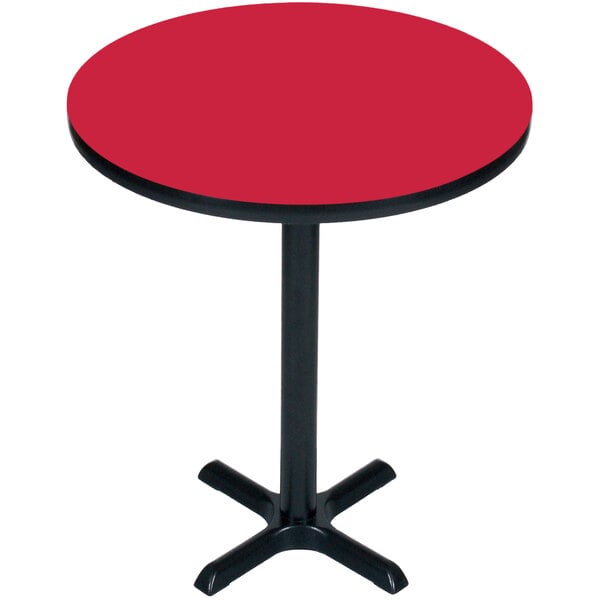 A red Correll bar height table with a black base and pole.