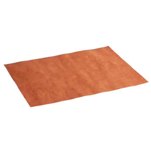 A brown PeachTREAT Steak Paper sheet on a white table.
