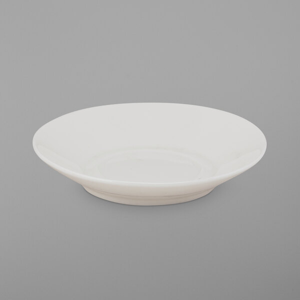 A white porcelain saucer with a small rim.