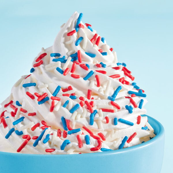 A cup of ice cream with Adourne red, white, and blue sprinkles.